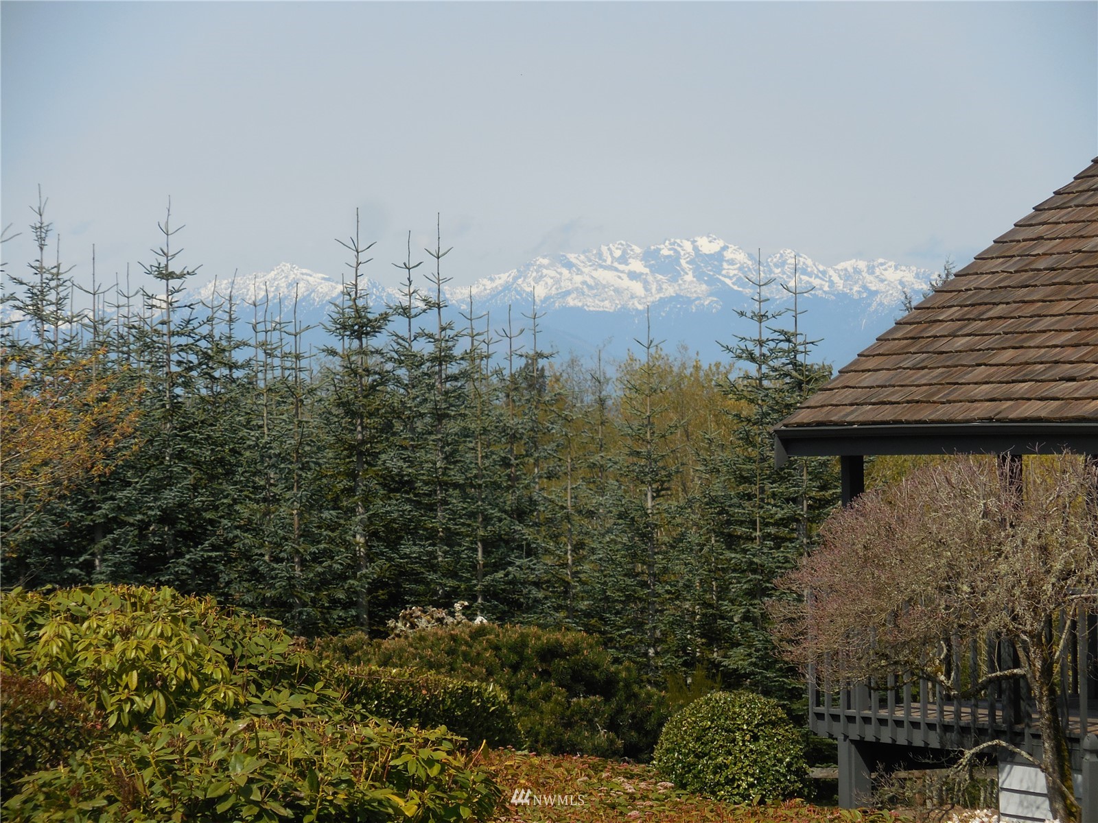 2530 Mountain View Road East Port Orchard, WA 98366 - Photo 2 of 34 a view of a house with a yard and garden