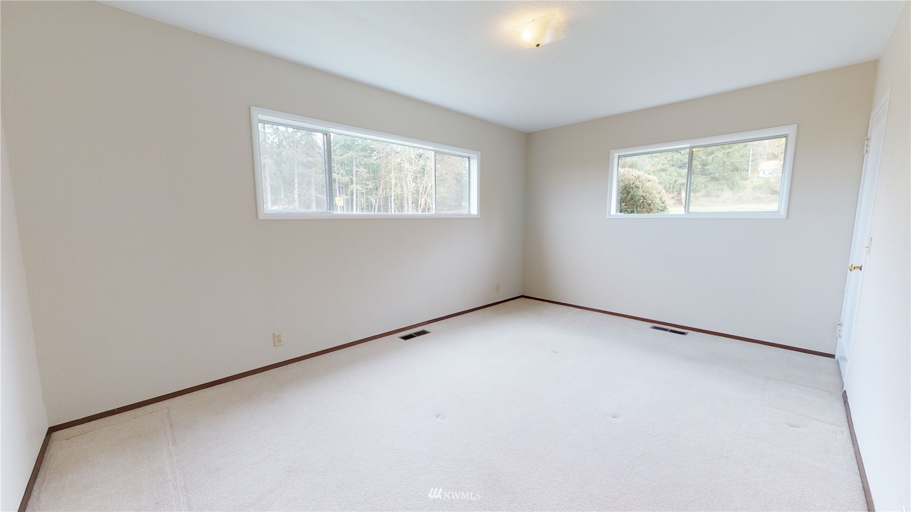 2530 Mountain View Road East Port Orchard, WA 98366 - Photo 24 of 34 an empty room with a window
