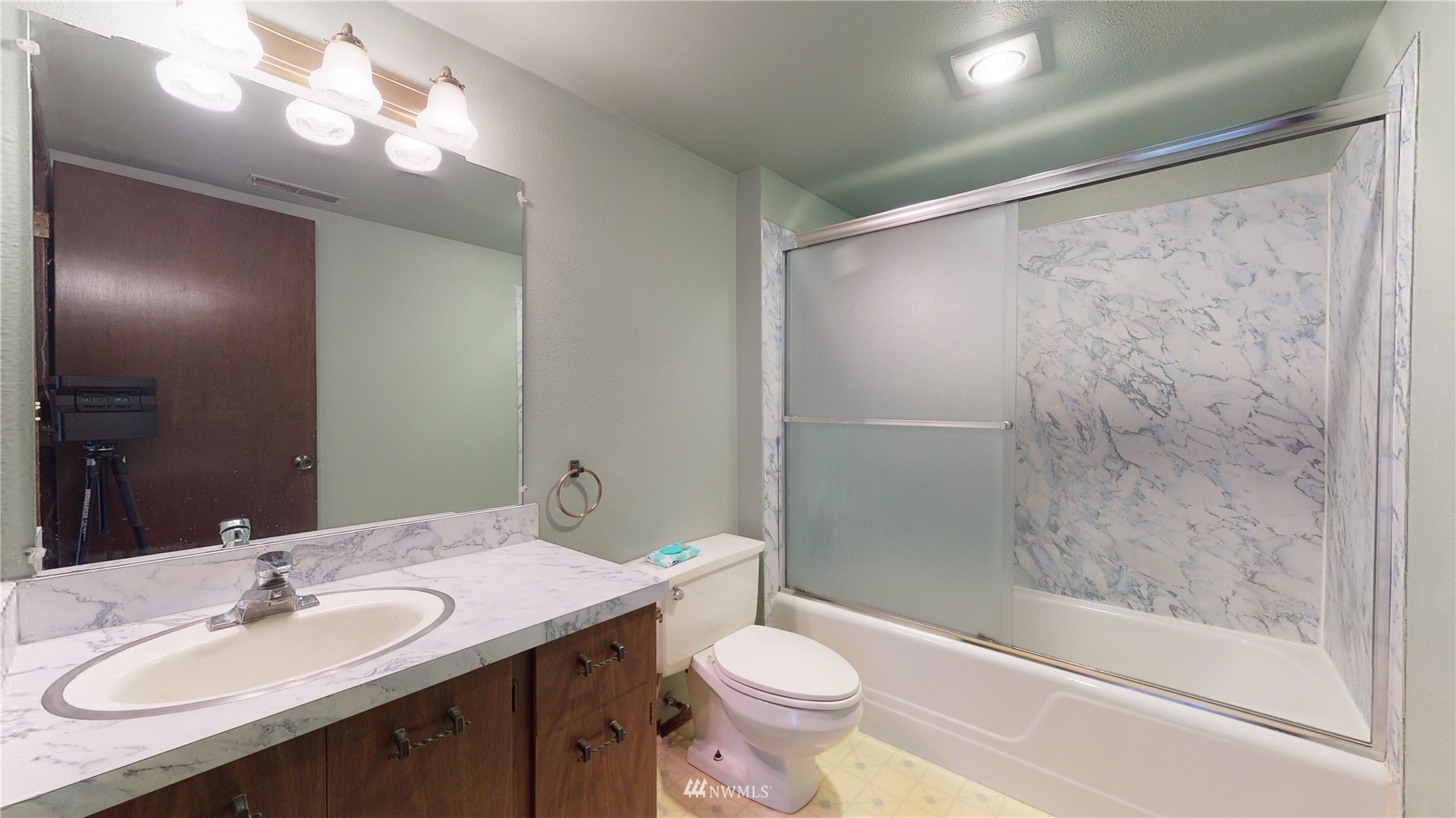 2530 Mountain View Road East Port Orchard, WA 98366 - Photo 29 of 34 a bathroom with a sink and a mirror