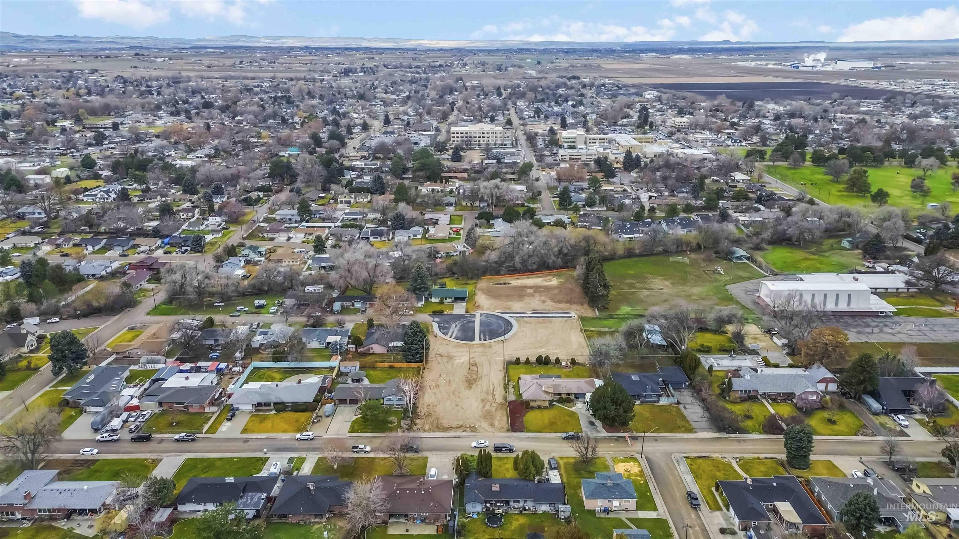 Oregon Avenue Caldwell, ID 83605 - Photo 5 of 42 Aerial view of property and surrounding area with nearby suburban area