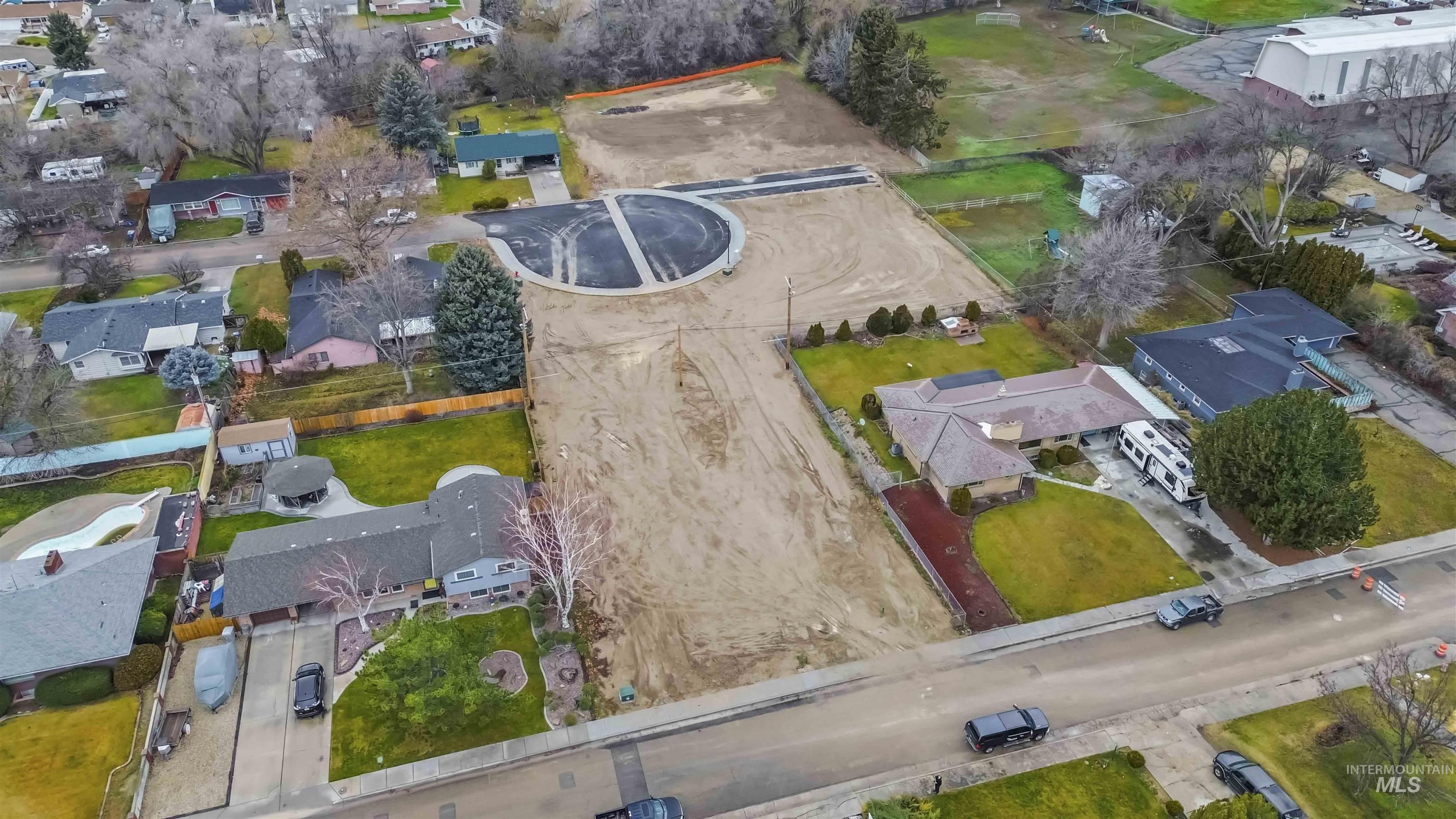Oregon Avenue Caldwell, ID 83605 - Photo 9 of 42 Aerial view of property and surrounding area with nearby suburban area