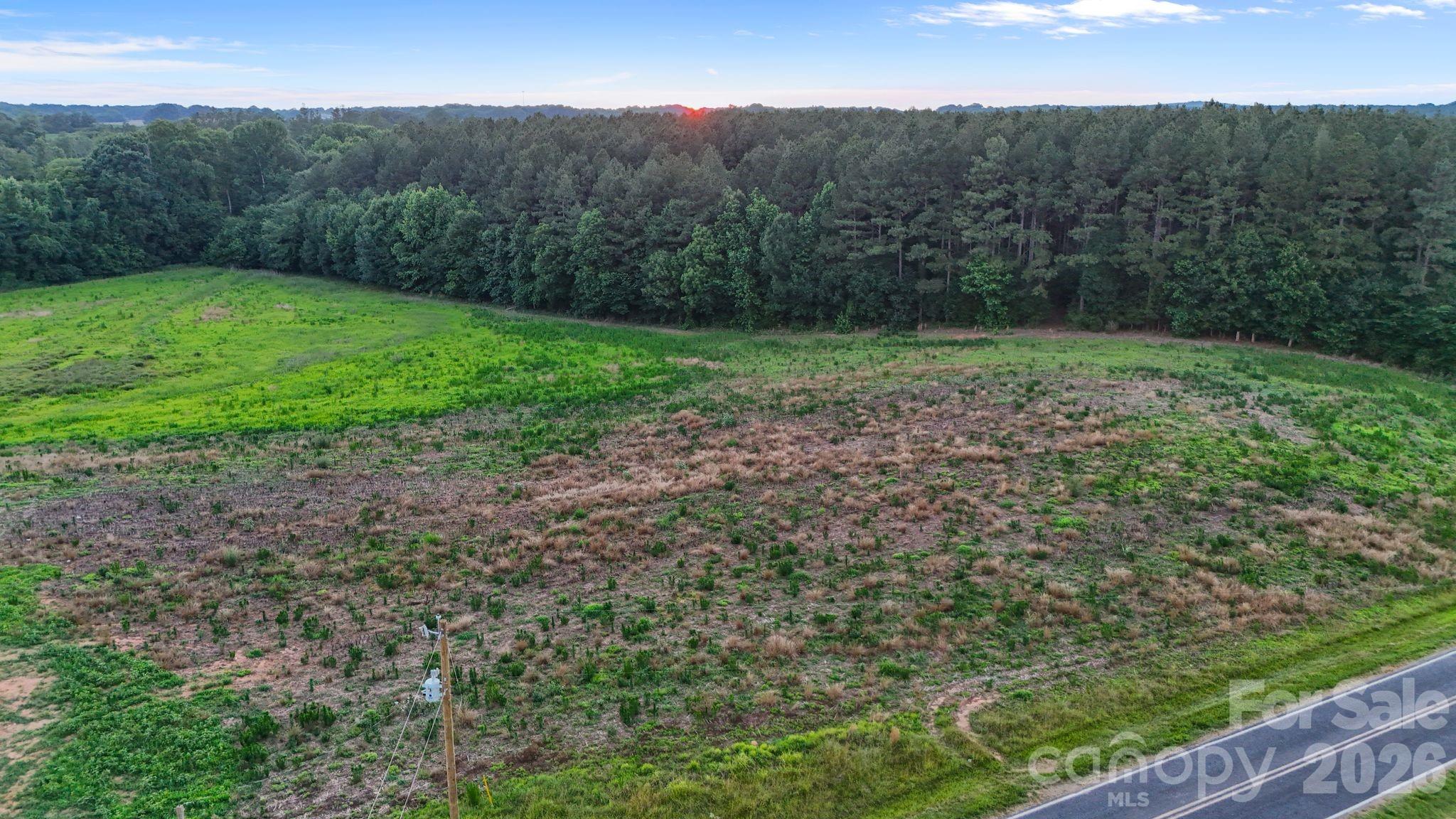 0 Lucy Short Cut Road, Unit 2 Marshville, NC 28103 - Photo 21 of 38 a view of a yard with a mountain