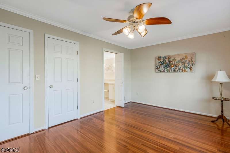 46 Eton Court Bedminster, NJ 07921 - Photo 16 of 30 a view of empty room with wooden floor