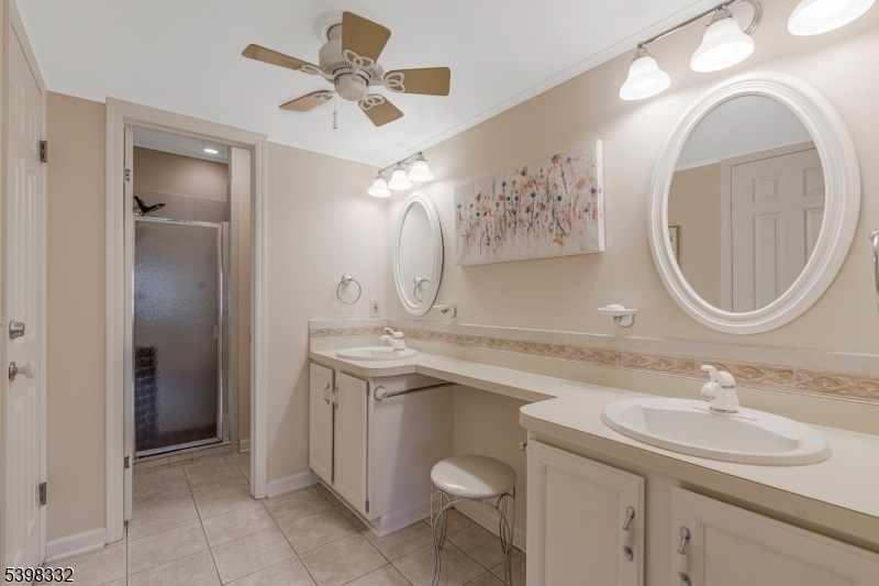 46 Eton Court Bedminster, NJ 07921 - Photo 17 of 30 a bathroom with a double vanity sink mirror and