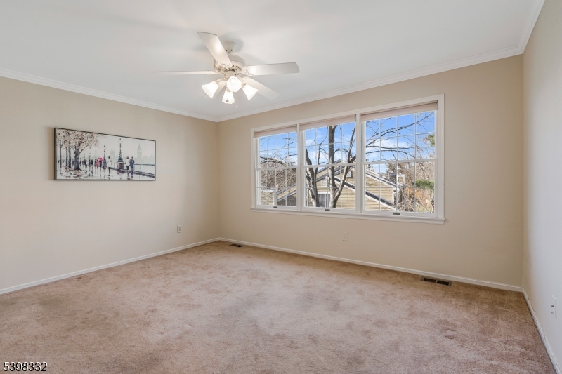 46 Eton Court Bedminster, NJ 07921 - Photo 21 of 30 a view of an empty room with painting on the wall
