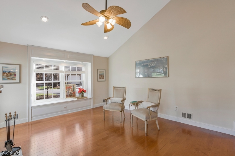 46 Eton Court Bedminster, NJ 07921 - Photo 4 of 30 a view of a livingroom with furniture window and wooden floor