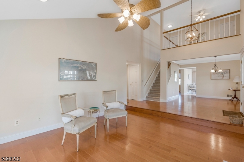 46 Eton Court Bedminster, NJ 07921 - Photo 5 of 30 a view of a dining room with furniture and a chandelier fan