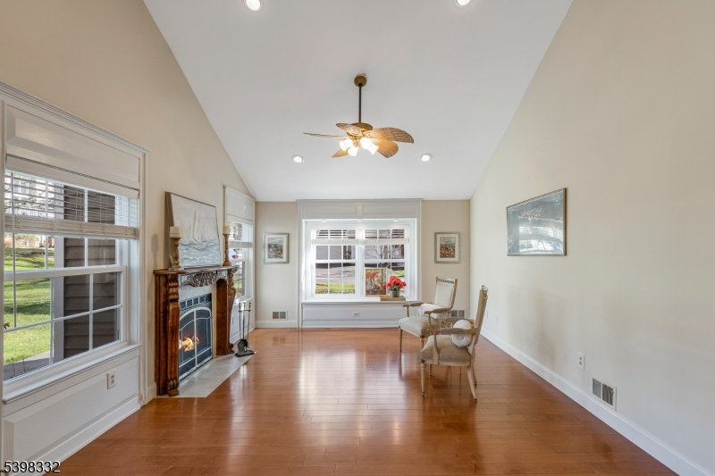 46 Eton Court Bedminster, NJ 07921 - Photo 6 of 30 a view of a livingroom with furniture hardwood floor and a large window