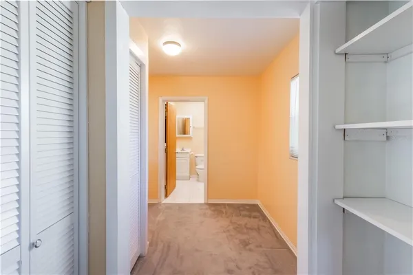a view of a hallway with painted walls