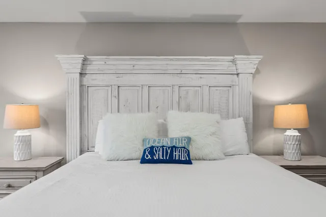 a bathroom with a granite countertop sink mirror and vanity