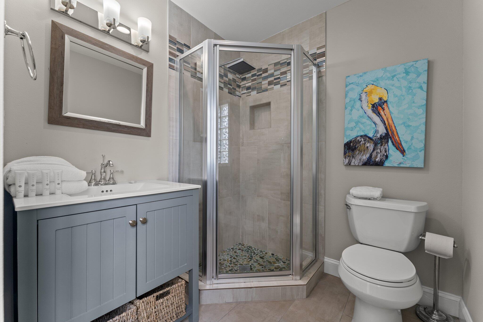 4455 Ocean View Drive Destin, FL 32541 - Photo 39 of 56 a bathroom with a toilet sink and mirror