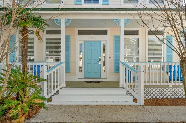 a view of a two chairs in the balcony