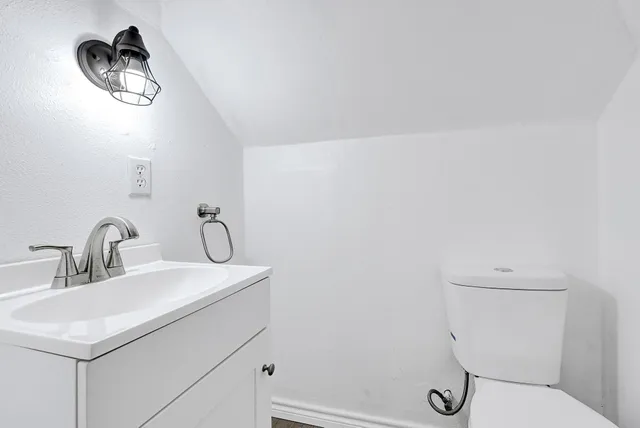 a view of house with door and outdoor space