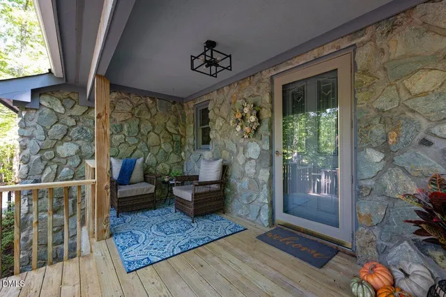 a view of living room filled with furniture