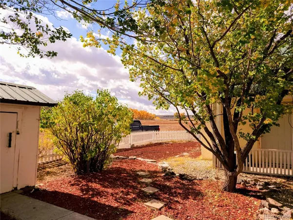 a view of backyard with green space