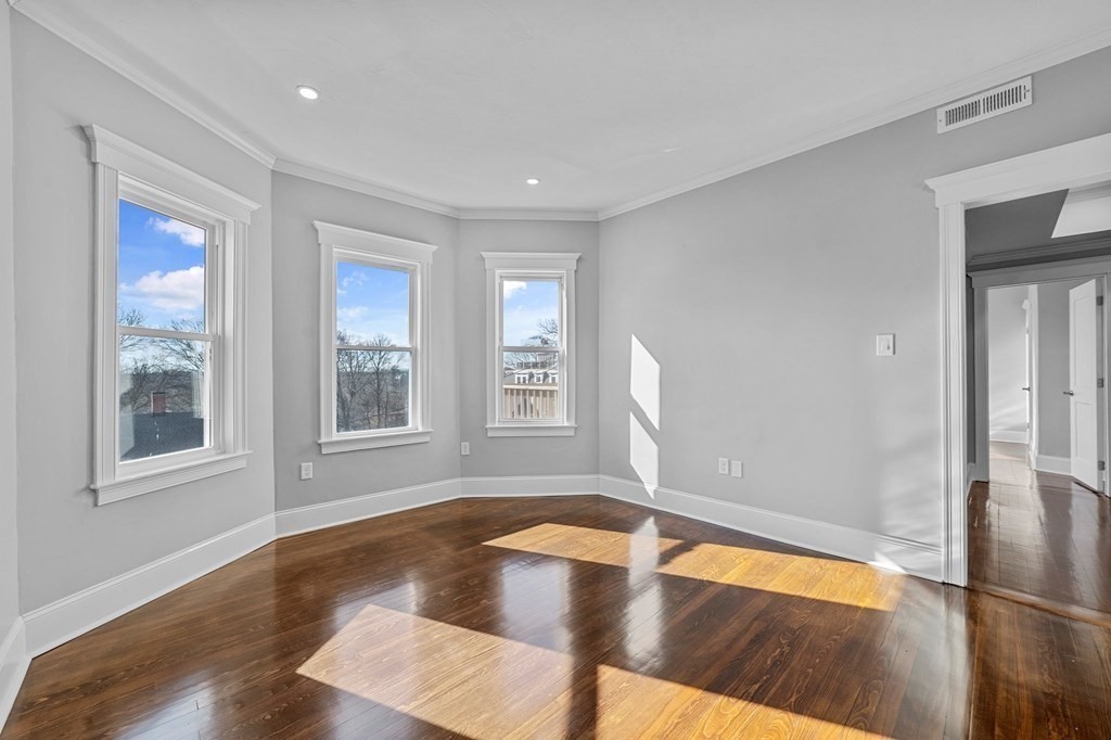 44 Bowdoin Street, Unit 2 Boston, MA 02124 - Photo 3 of 33 a view of a room with wooden floor and pool table