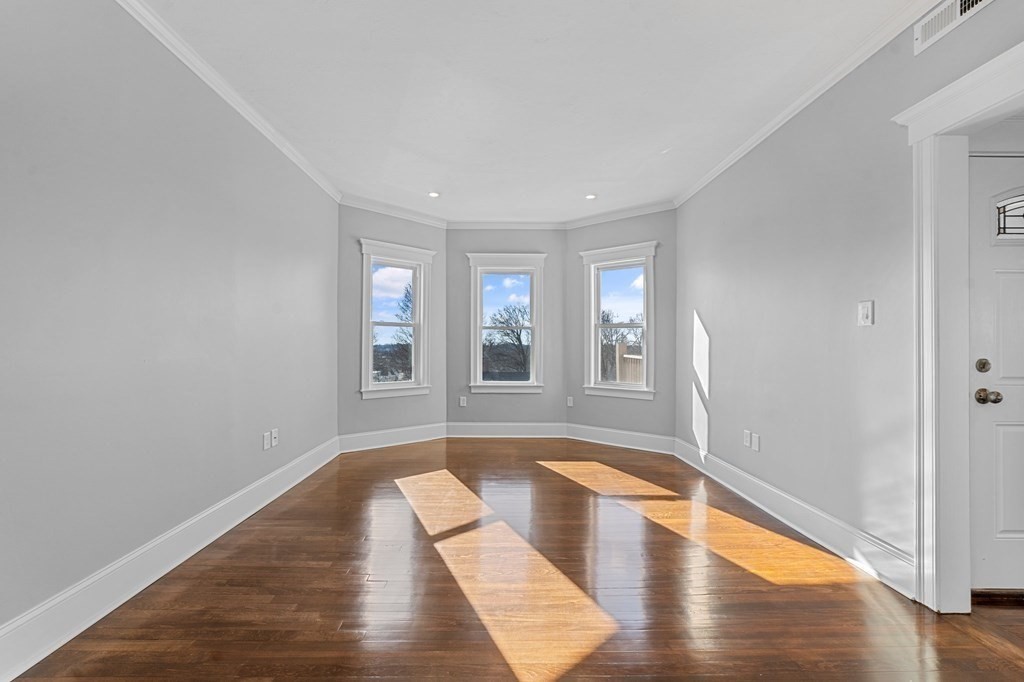 44 Bowdoin Street, Unit 2 Boston, MA 02124 - Photo 4 of 33 a view of livingroom with hardwood