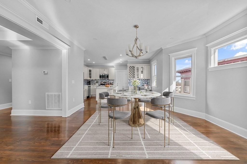 44 Bowdoin Street, Unit 2 Boston, MA 02124 - Photo 8 of 33 a view of a dining room with furniture
