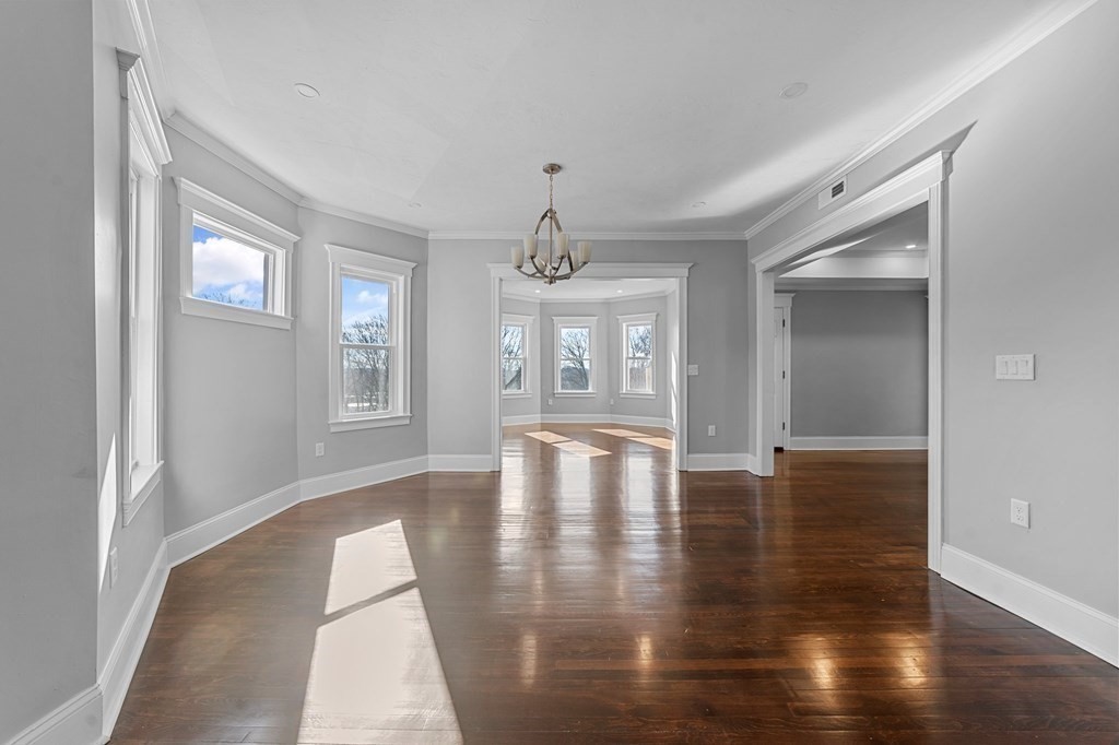 44 Bowdoin Street, Unit 2 Boston, MA 02124 - Photo 9 of 33 a view of an entryway with wooden floor