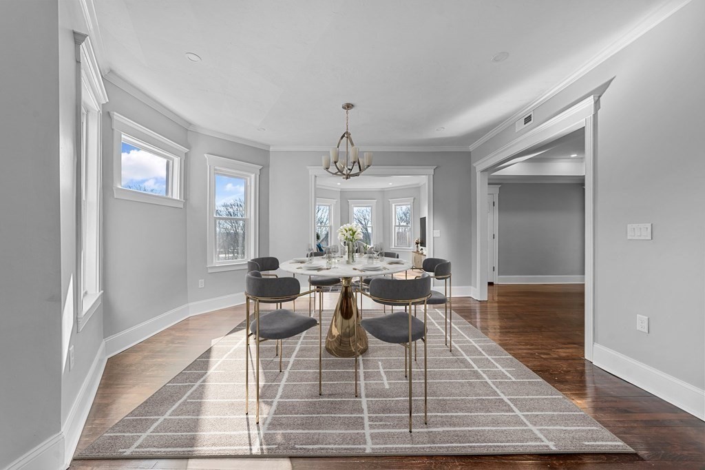 44 Bowdoin Street, Unit 2 Boston, MA 02124 - Photo 10 of 33 a view of a dining room with furniture and window