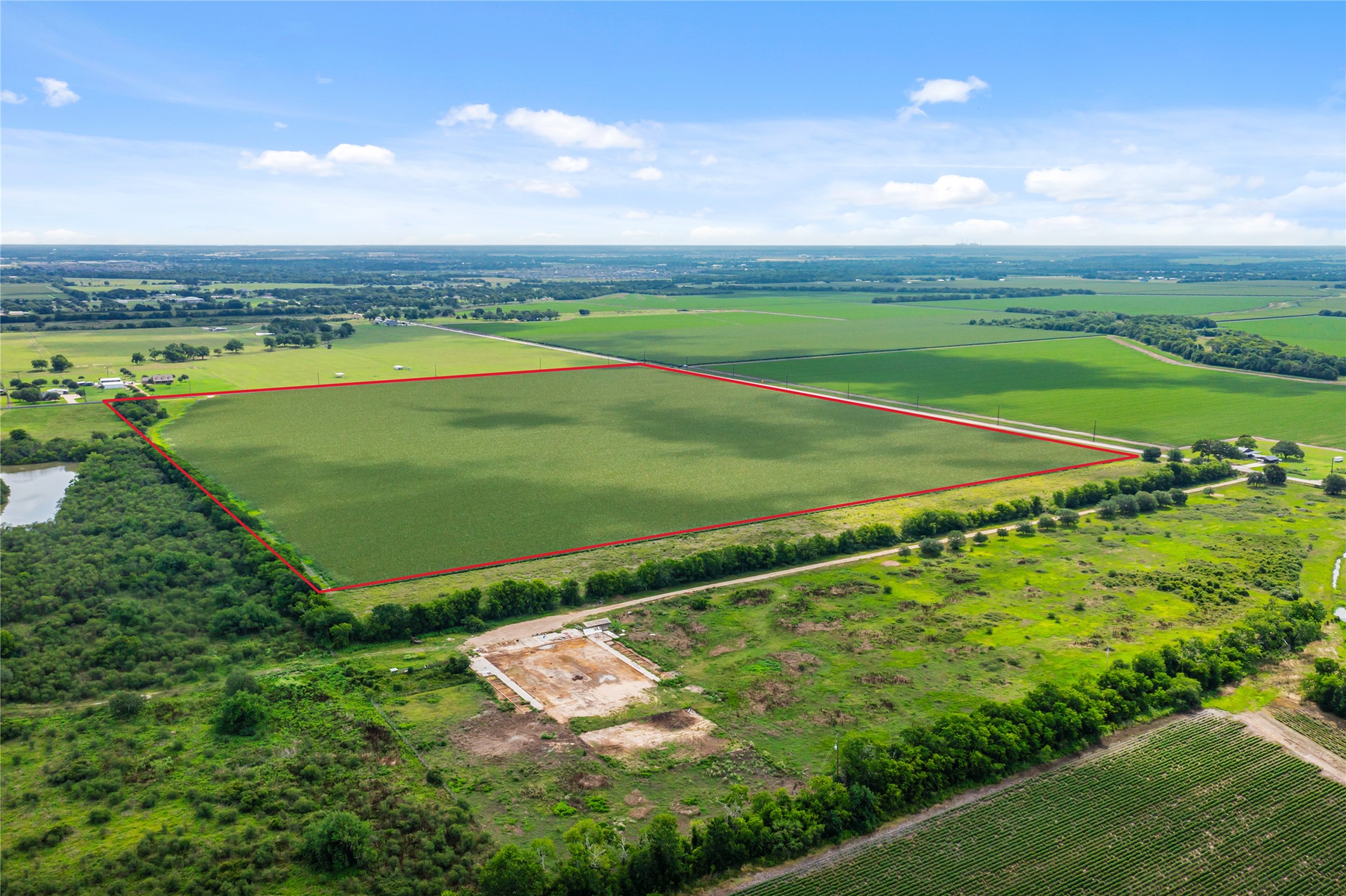 0 Kunz Road Rosenberg, TX 77471 - Photo 14 of 18 an aerial view of a golf course with a swimming pool