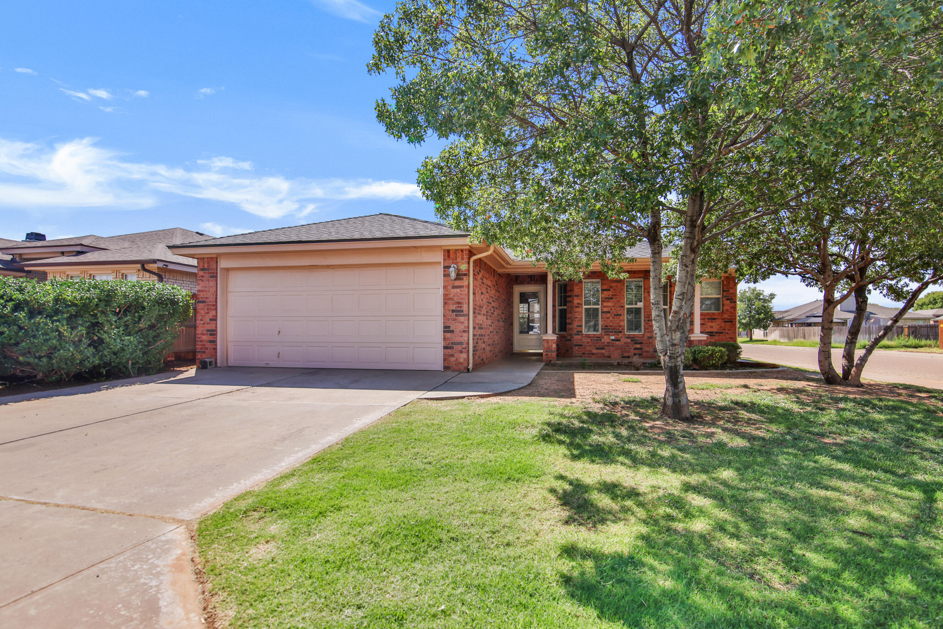 2117 99th Street Lubbock, TX 79423 - Photo 1 of 30 a house view with a garden space