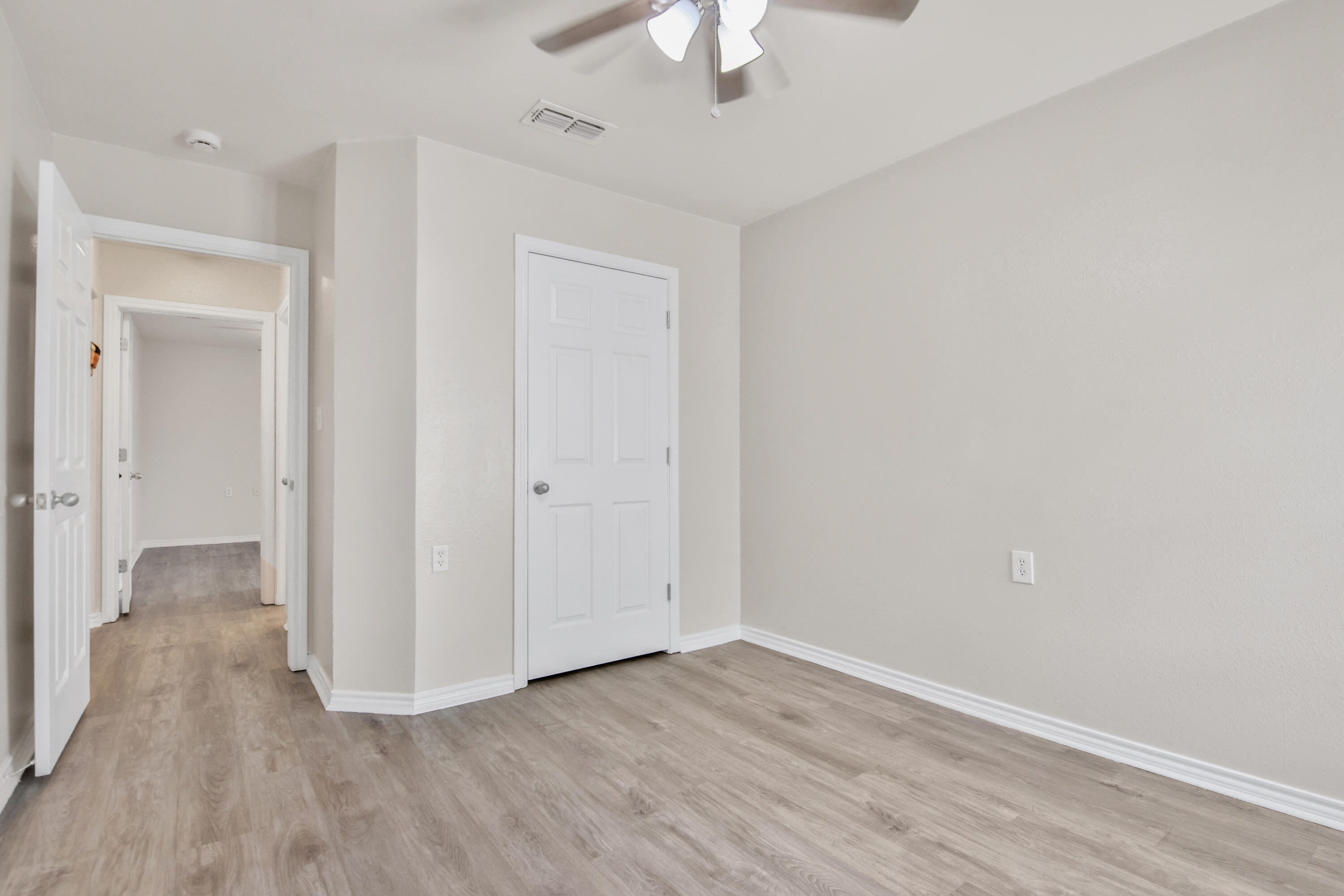 2117 99th Street Lubbock, TX 79423 - Photo 20 of 30 wooden floor in an empty room