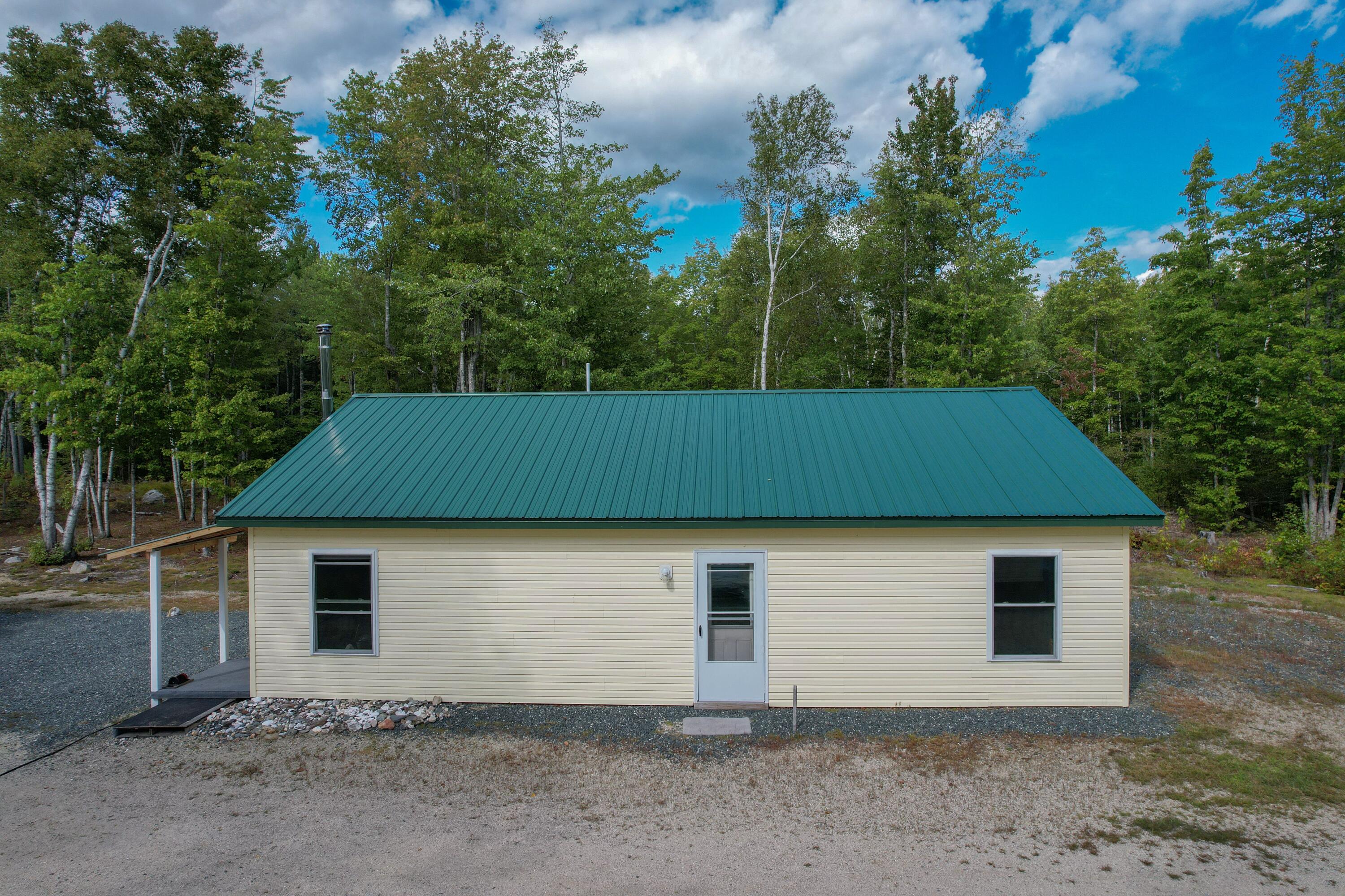 940 Macomber Mill Road Eastbrook, ME 04634 - Photo 33 of 62 Side view of home