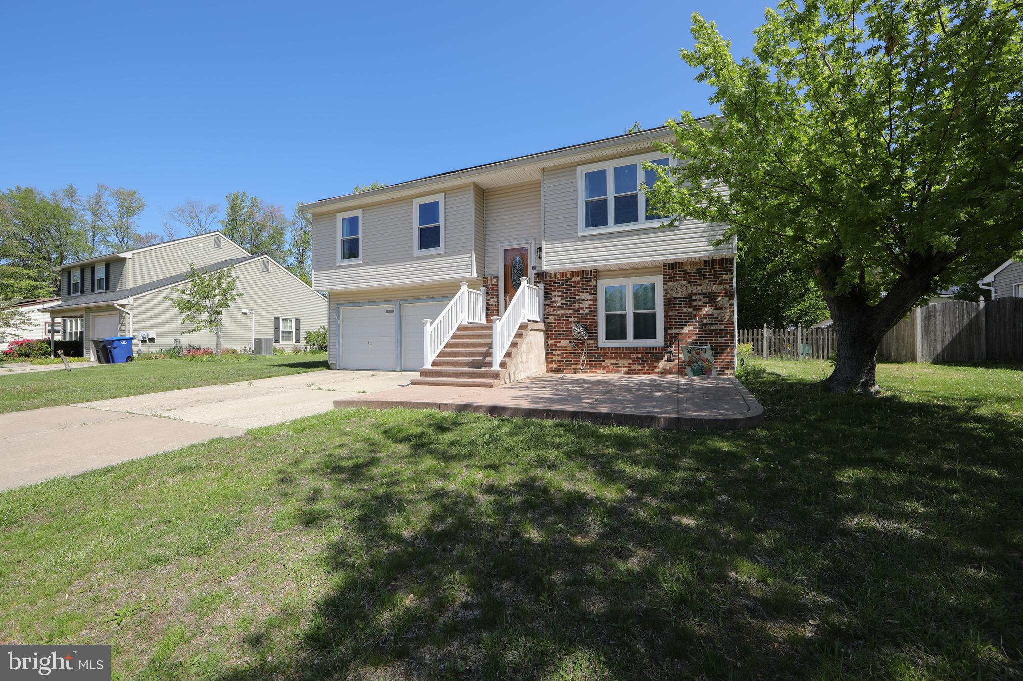 64 Tarnsfield Road Westampton, NJ 08060 - Photo 1 of 41 a front view of a house with garden