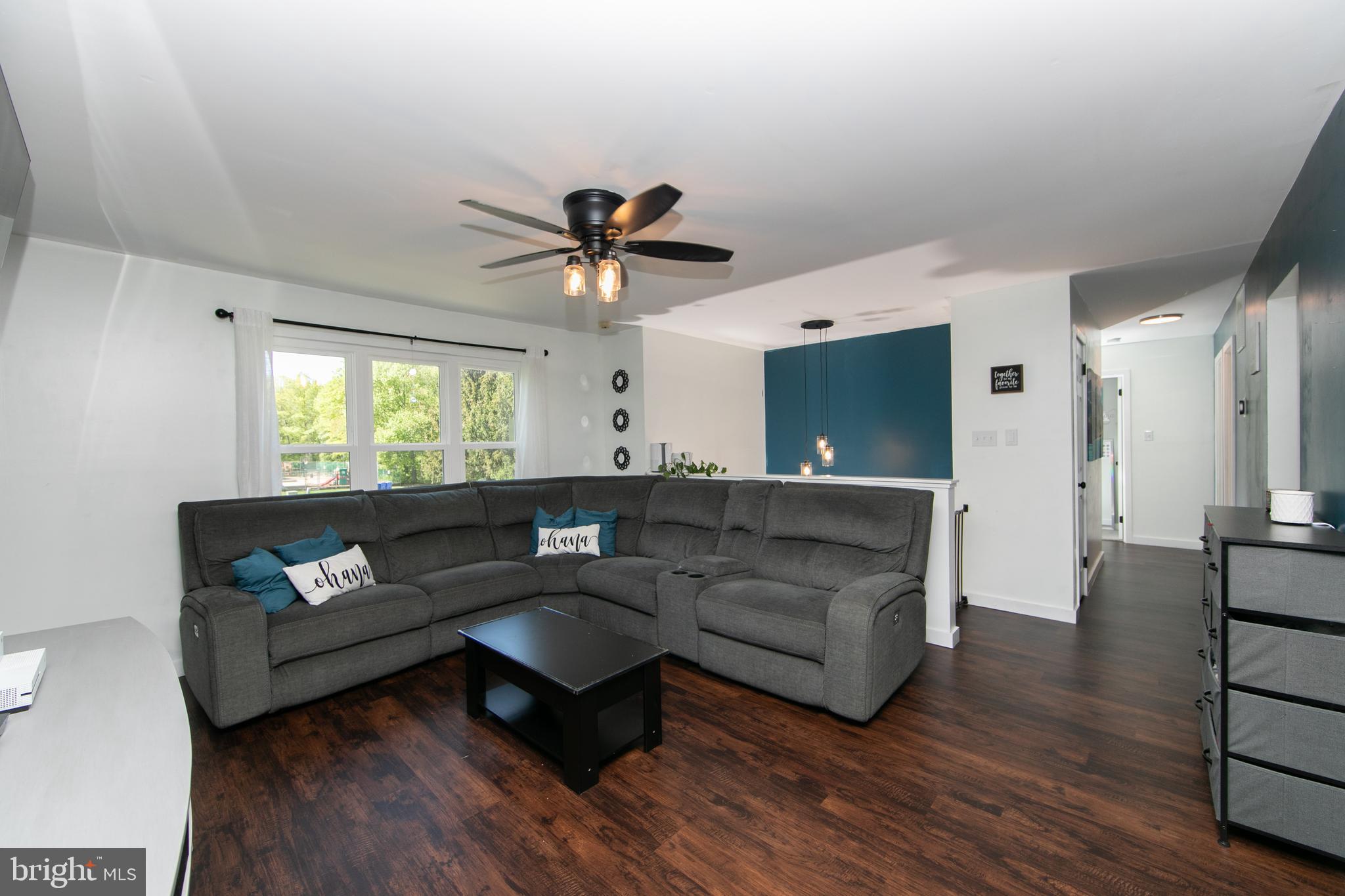 64 Tarnsfield Road Westampton, NJ 08060 - Photo 3 of 41 a living room with furniture and a flat screen tv