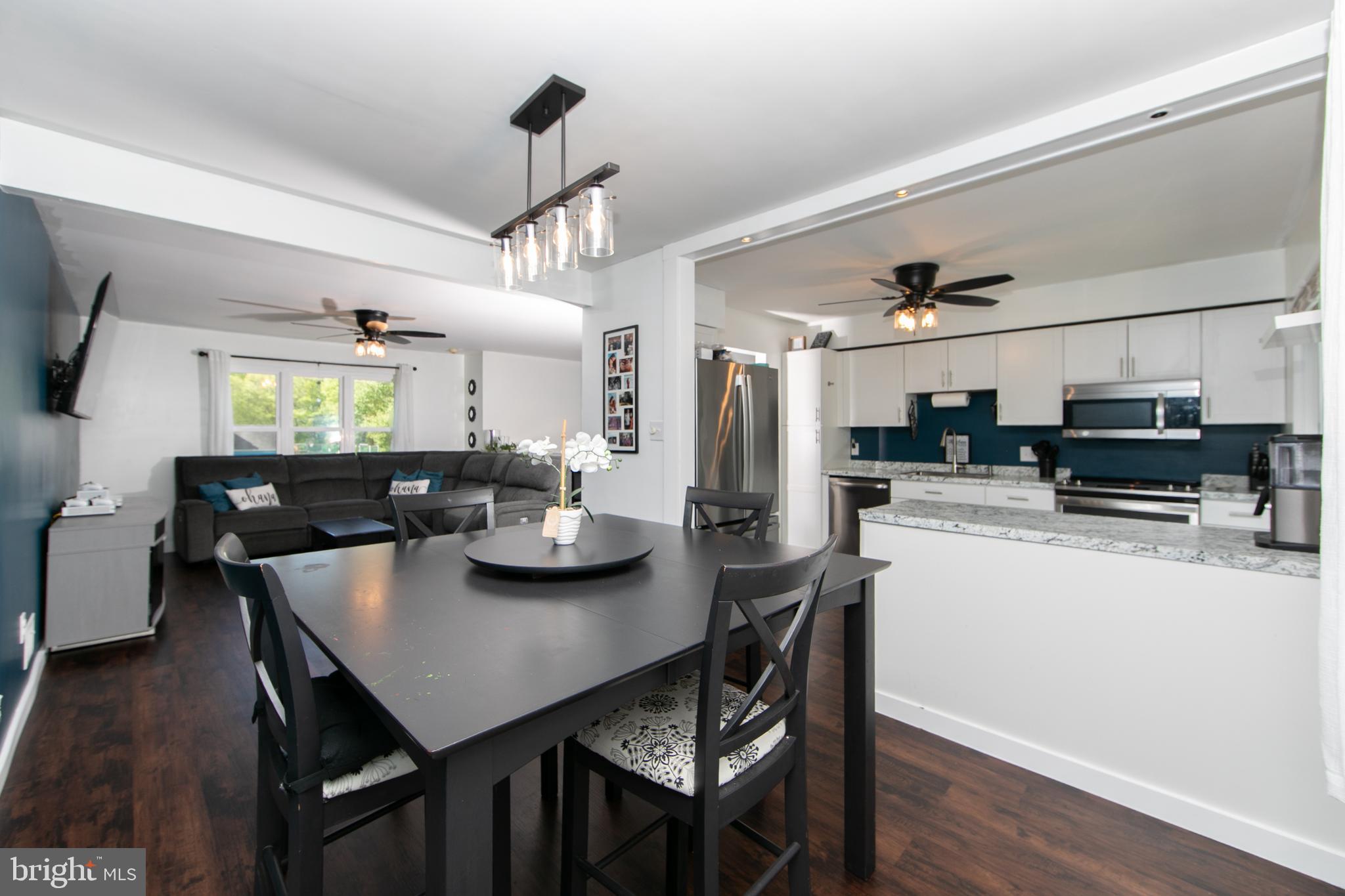 64 Tarnsfield Road Westampton, NJ 08060 - Photo 9 of 41 a kitchen with a dining table and chairs