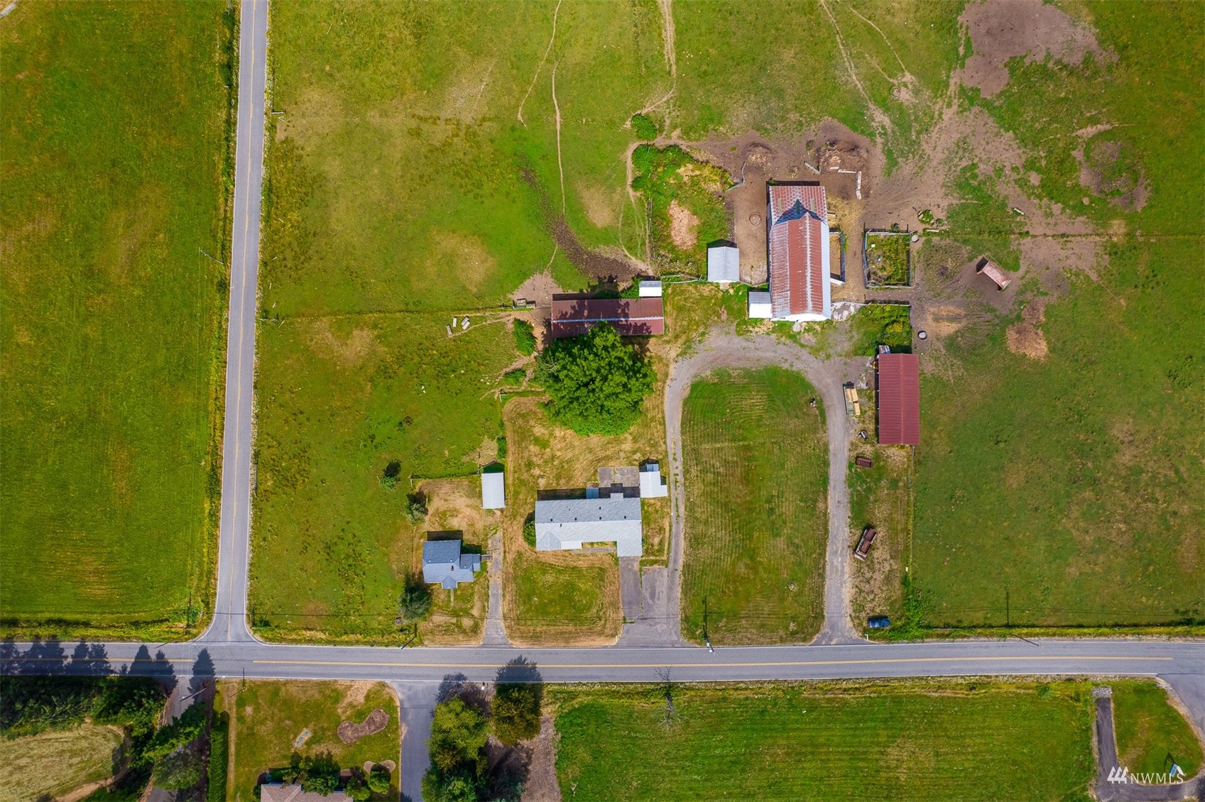 718 East Laurel Road Bellingham, WA 98226 - Photo 11 of 40 an aerial view of a residential houses with swimming pool