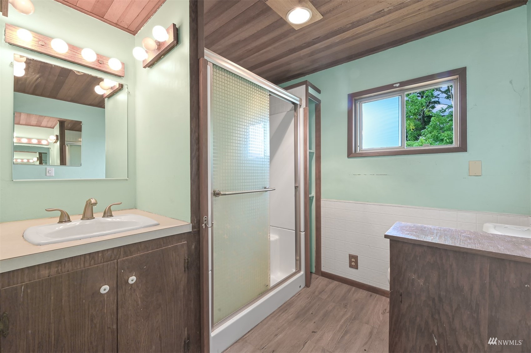 718 East Laurel Road Bellingham, WA 98226 - Photo 26 of 40 a bathroom with a sink mirror and vanity