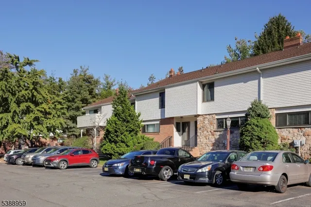 a car parked in front of a house