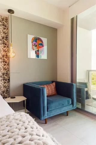 a living room with furniture and rug