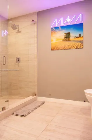 a bathroom with a sink and a shower