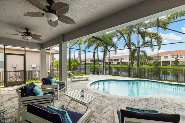 a living room with hardwood floor and a garden