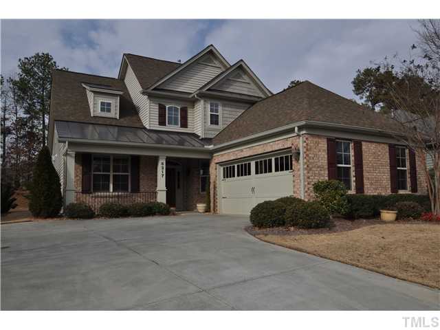 6217 Oconner Street Raleigh, NC 27617 - Photo 1 of 17 a front view of a house with garden