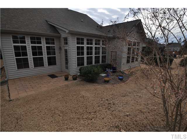 6217 Oconner Street Raleigh, NC 27617 - Photo 16 of 17 a front view of a house with garden