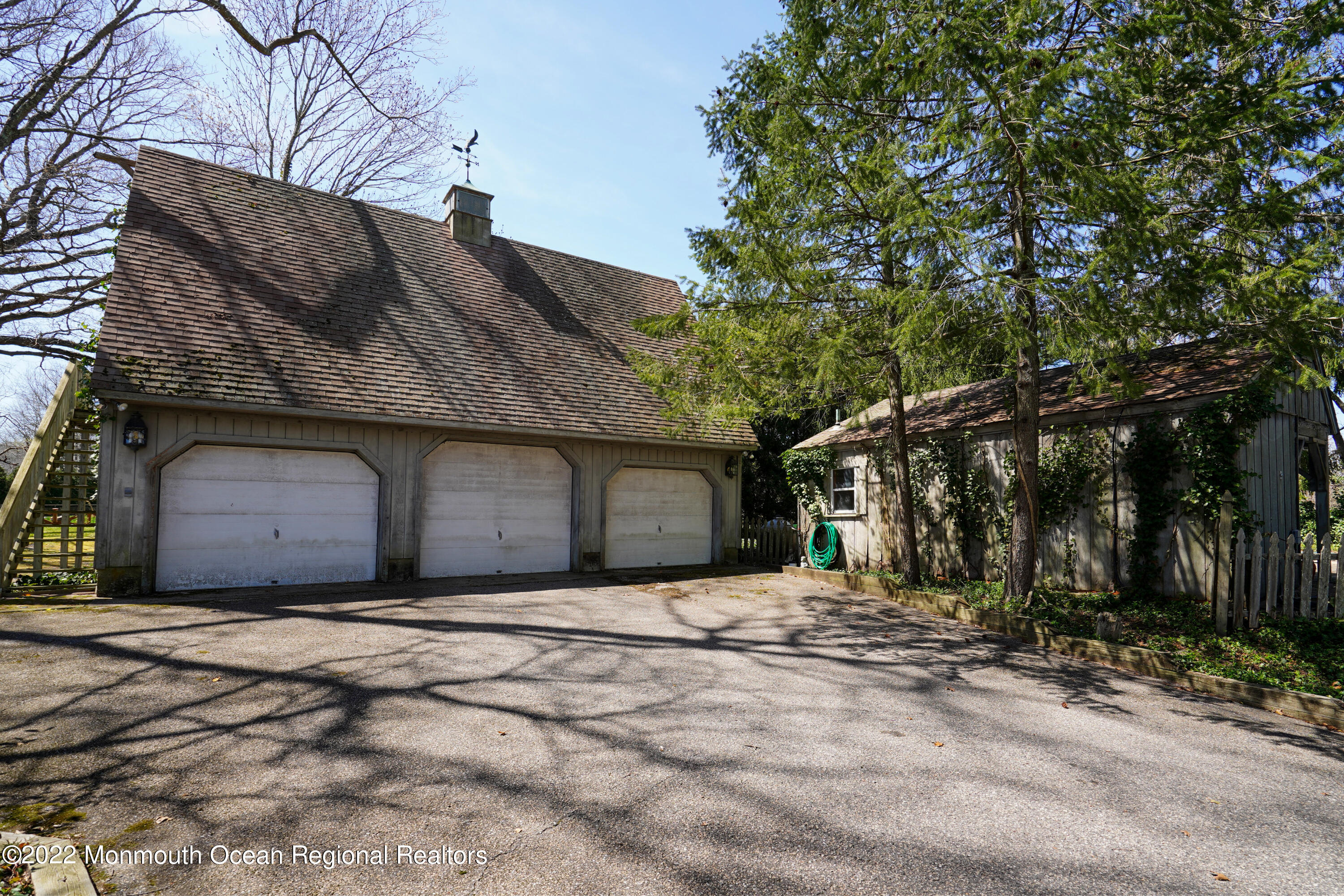 634 Turkey Point Road Brick, NJ 08724 - Photo 19 of 42 3 car garage and rear pool cabana