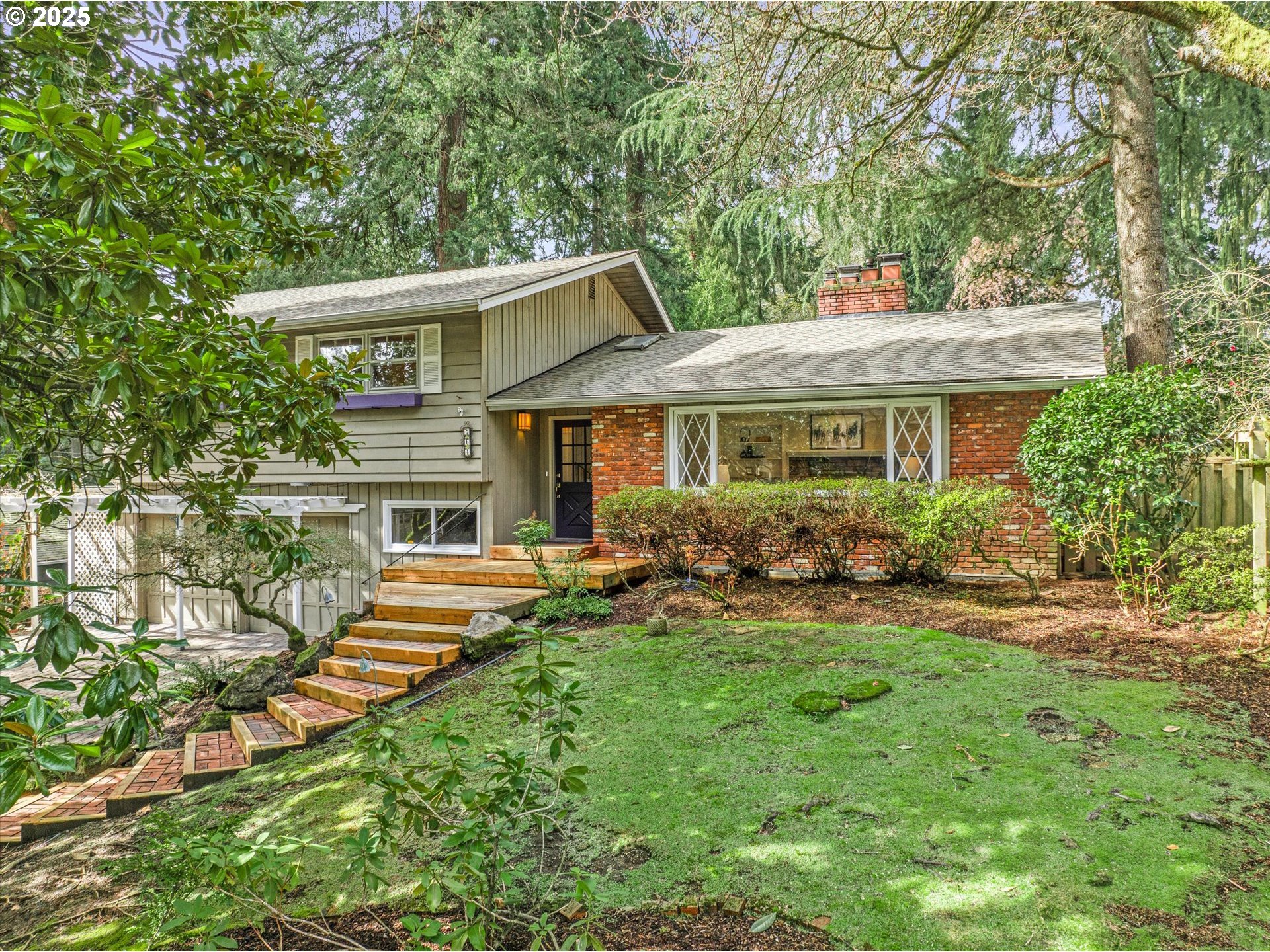 764 10th Street Lake Oswego, OR 97034 - Photo 1 of 41 a house view with a garden space