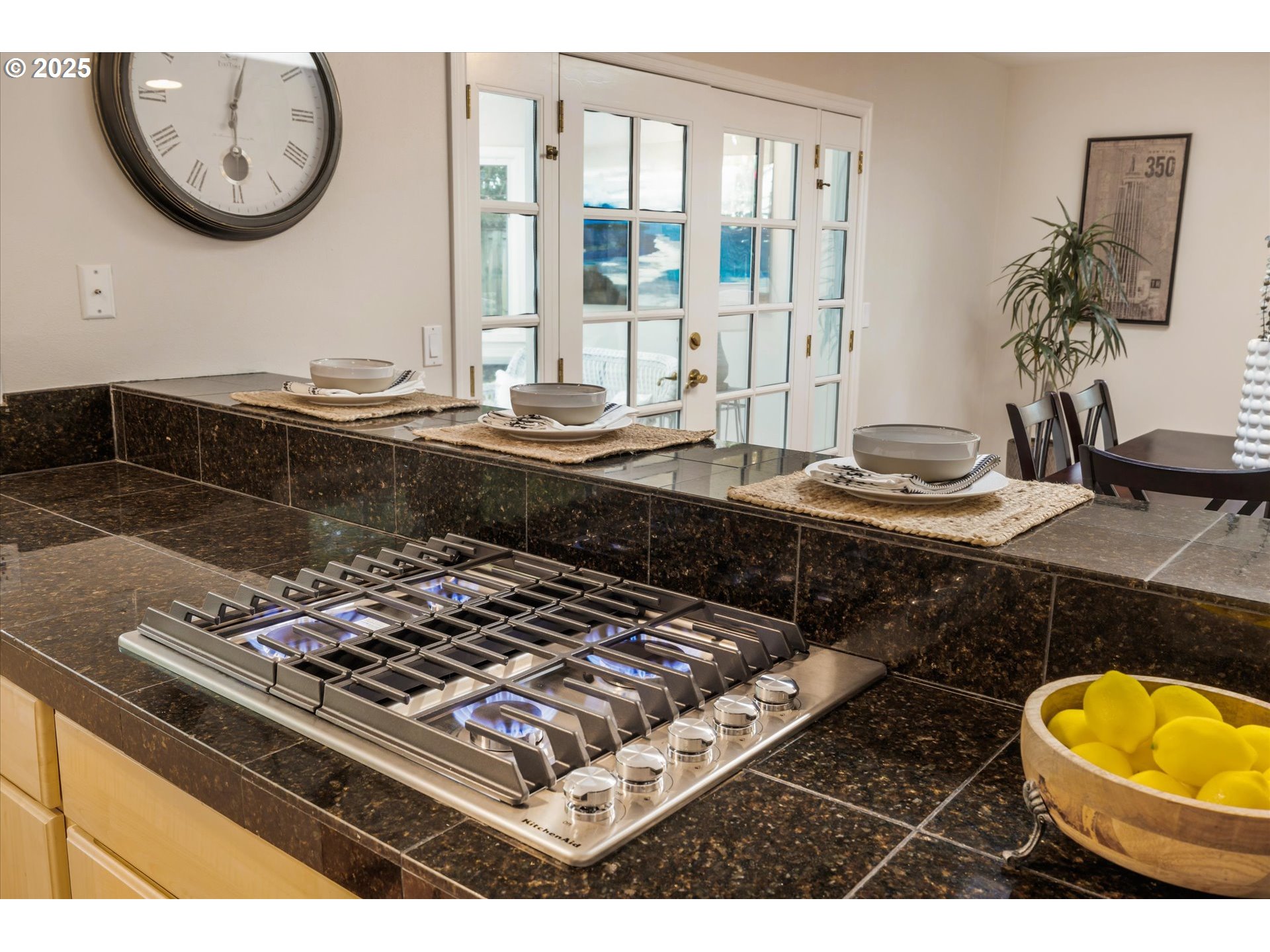 764 10th Street Lake Oswego, OR 97034 - Photo 18 of 41 a kitchen with a stove a sink and a dining table