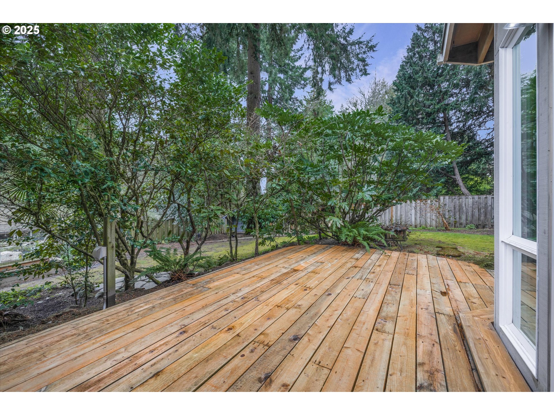 764 10th Street Lake Oswego, OR 97034 - Photo 22 of 41 a view of backyard with a wooden floor