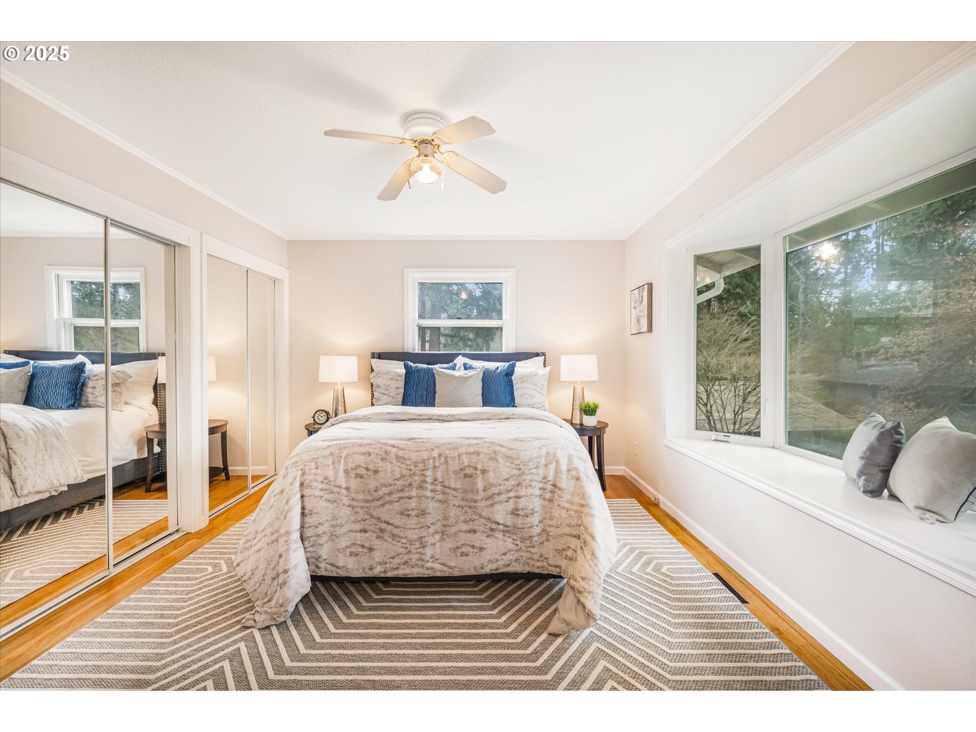 764 10th Street Lake Oswego, OR 97034 - Photo 27 of 41 a bedroom with a bed and wooden floor