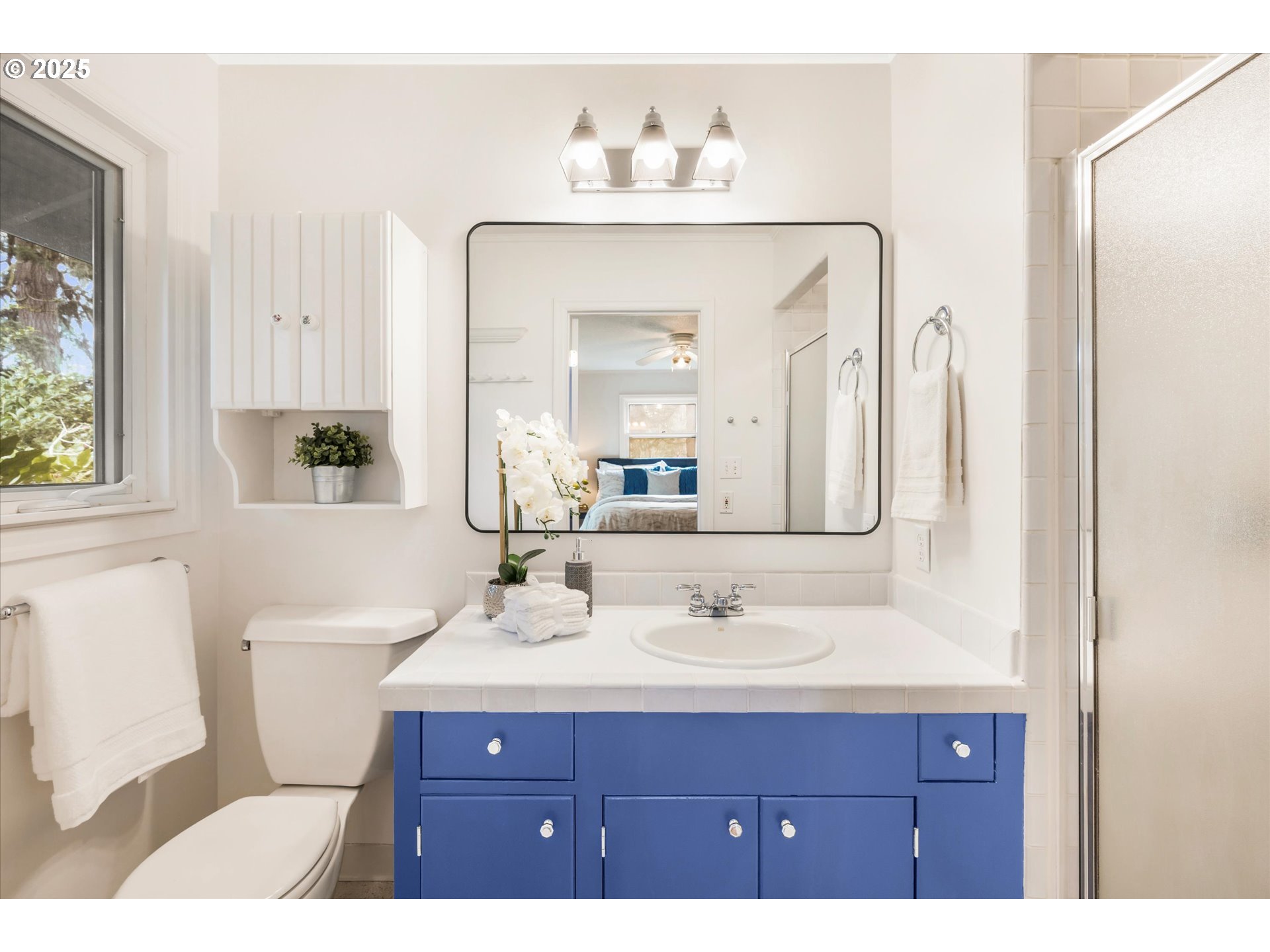 764 10th Street Lake Oswego, OR 97034 - Photo 29 of 41 a bathroom with a sink vanity and a mirror