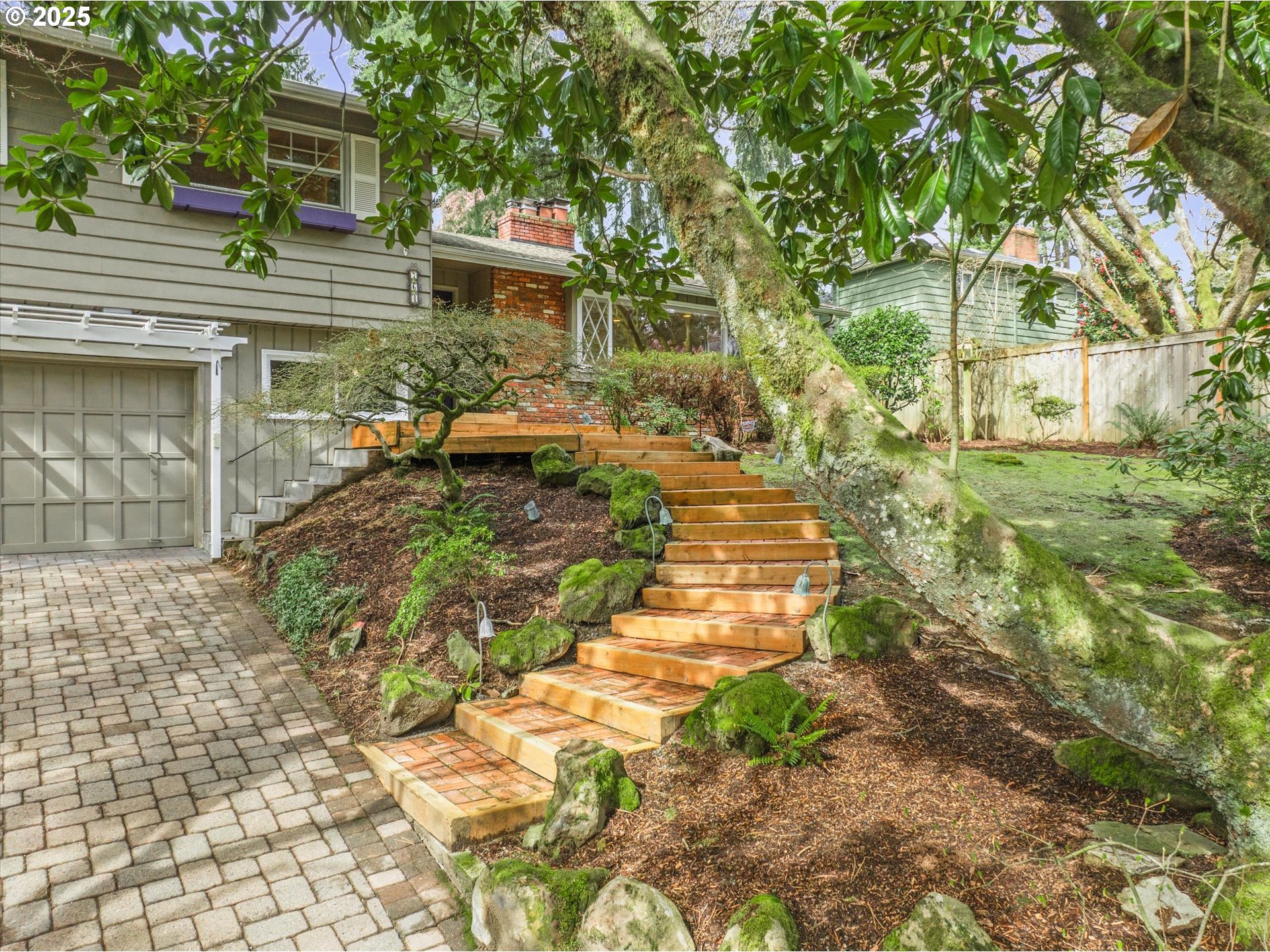 764 10th Street Lake Oswego, OR 97034 - Photo 7 of 41 a backyard of a house with yard and outdoor seating