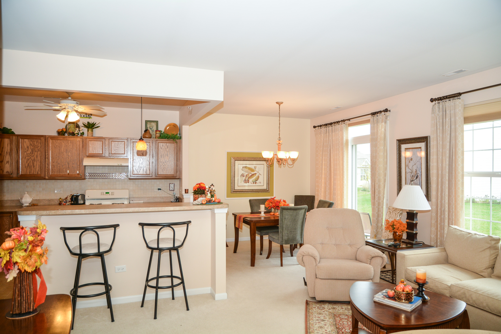 13656 Hemlock Road Huntley, IL 60142 - Photo 3 of 19 a kitchen with a dining table and chairs