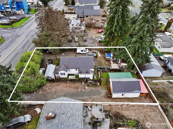 an aerial view of house with a swimming pool