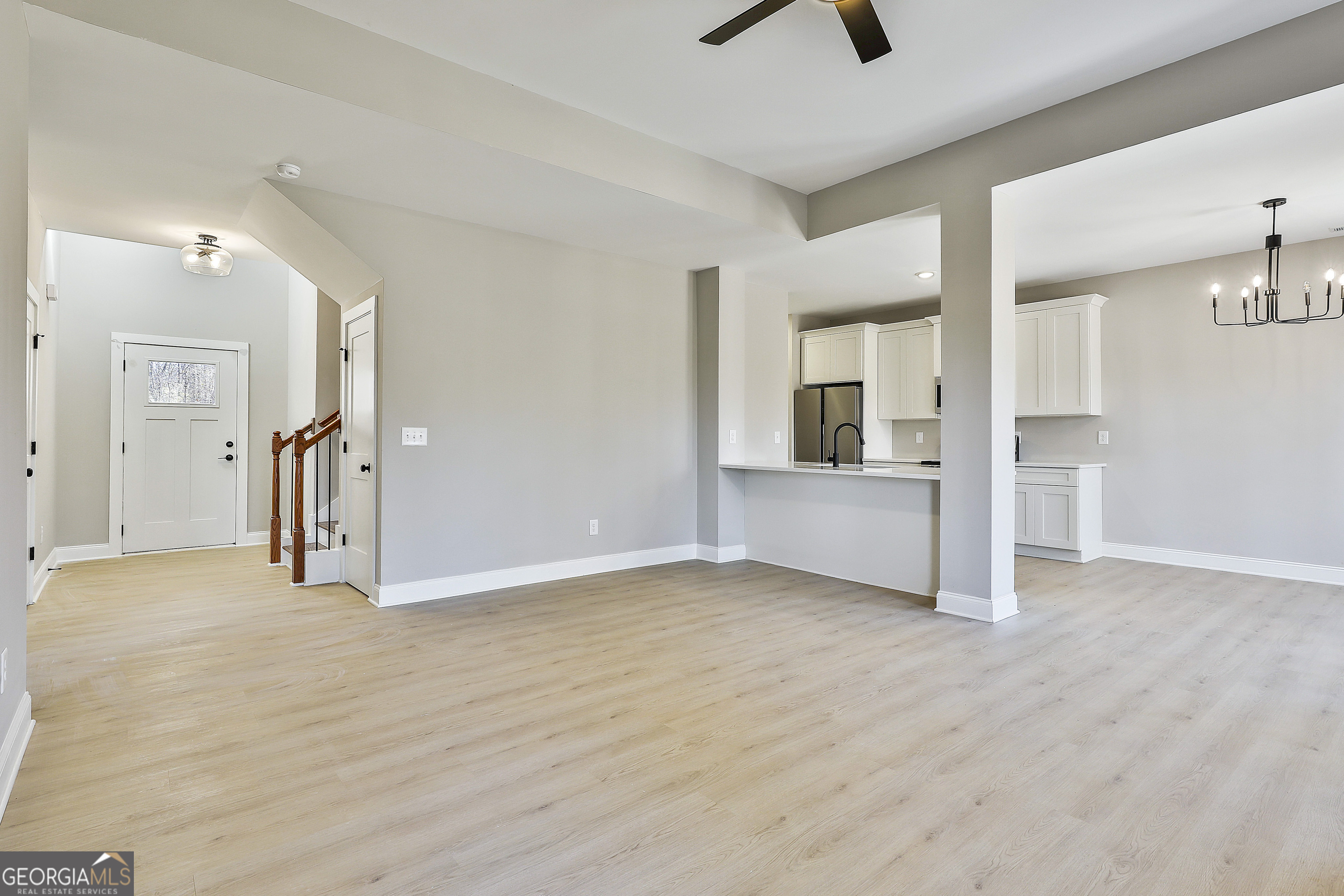 35 Oak Road Locust Grove, GA 30248 - Photo 11 of 36 a view of empty room with wooden floor