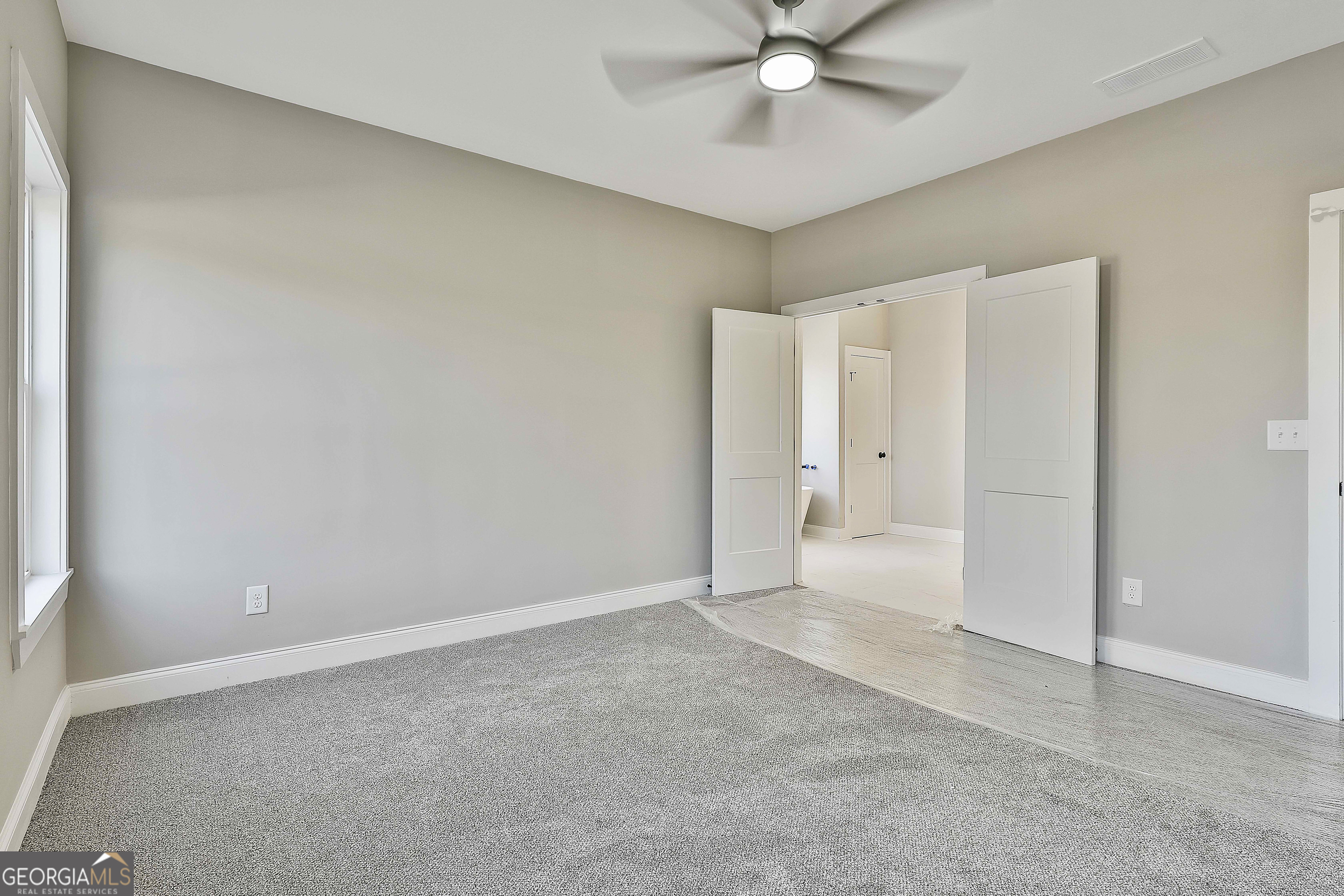 35 Oak Road Locust Grove, GA 30248 - Photo 19 of 36 a view of an empty room